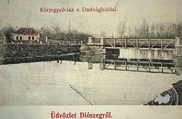 A régi községháza a Dudvággal és a híddal valamikor a 20. század elején.